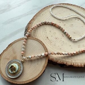 Elephant necklace. Repurposed button necklace featuring a repurposed vintage